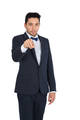 Handsome man doing different expressions in different sets of clothes: pointing