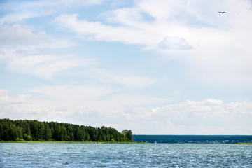 Blue Sky and White Clouds, Green Forest and Blue Waters of River