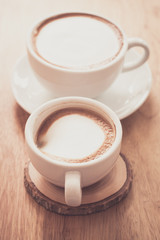 capucino coffee on wood table