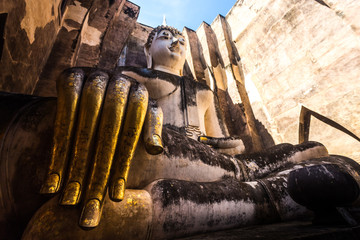 Ancient buddha statues in the temple ruins.