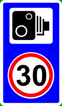 Speed camera enforcing 30mph speed limit traffic sign