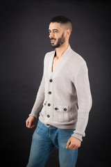 Fototapeta premium Handsome man doing different expressions in different sets of clothes: blinking