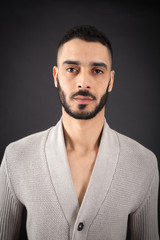 Obraz premium Handsome man doing different expressions in different sets of clothes: thinking