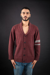 Handsome man doing different expressions in different sets of clothes: at attention