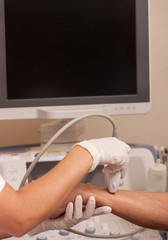 Fototapeta premium Undergoing medical test in hospital. Ultrasound sonography of hu