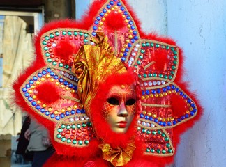 Star like carnival costume with murano stones at the Carnival of Venice, Italy