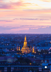 Wat Arun temple of a dawn in top view during twilight time , Bangkok , Thailand