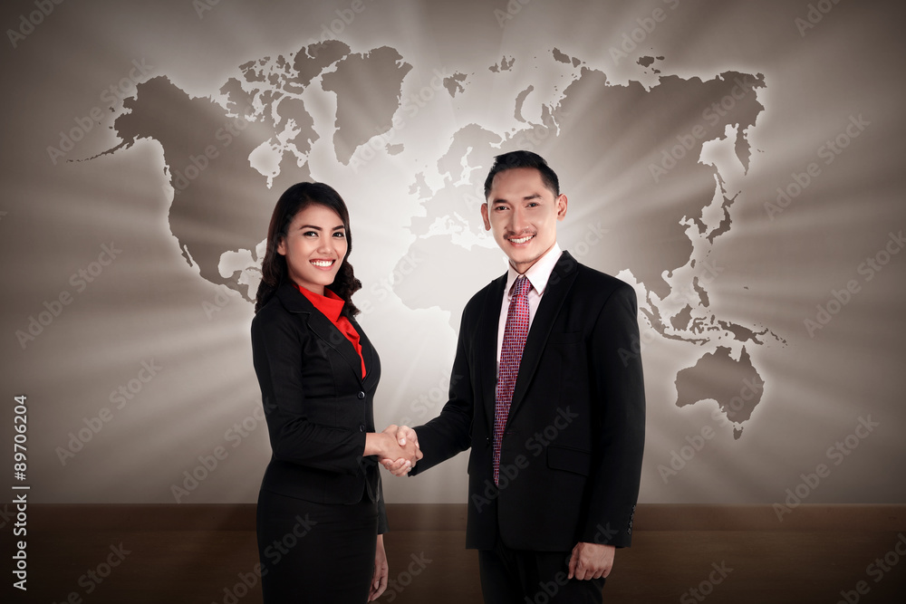 Wall mural man and woman shaking hand