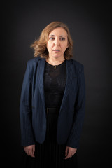 Beautiful woman doing different expressions in different sets of clothes: worried