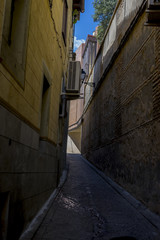 Traditional, streets of the city Toledo, medieval architecture a