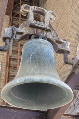 Fototapeta premium Iron, old bell in a Christian church, Toledo, Spain