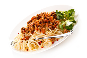 Pasta with meat, tomato sauce and vegetables on white background