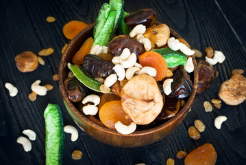 dried fruits in a wooden bowl
