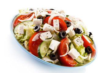 Greek salad on white background