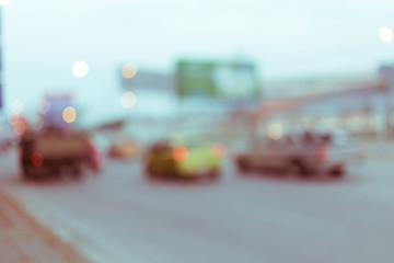 car driving on road with traffic jam in the city, abstract blurred