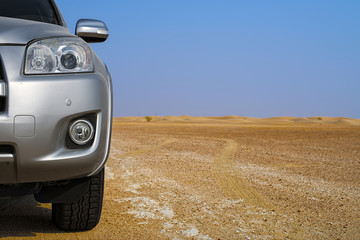 Fototapeta na wymiar Car in Desert