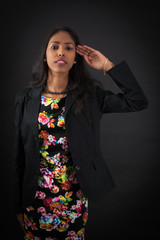 beautiful woman doing different expressions in different sets of clothes: at attention