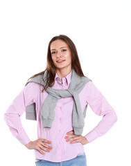 Young woman standing on the white background