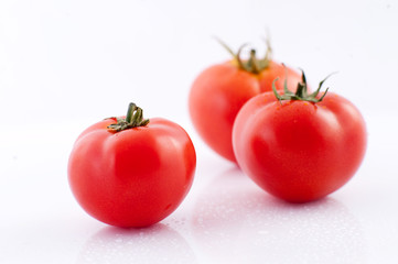 Tomatoes with drops of water