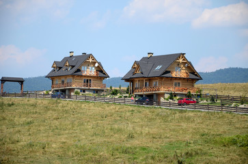 Landscape with wooden house