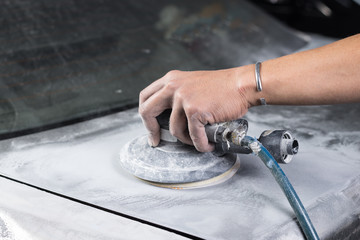 Fototapeta na wymiar Car paint repair series : Sanding trunk paint