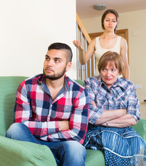 Home conflict at young family with mother