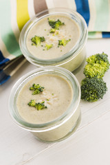 Broccoli cream soup on table