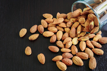 Pour almond on the table