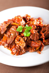 Chicken livers with tomato sauce