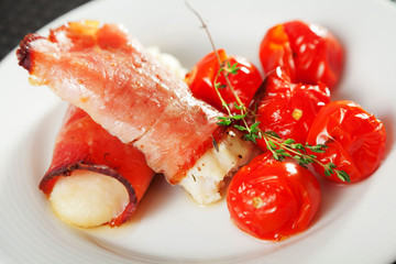 White fish wrapped in bakon