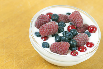 Delicious dessert made of yoghurt and ripe berries