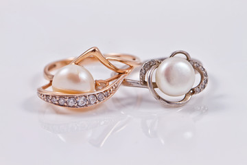 Elegant gold and silver ring with pearls