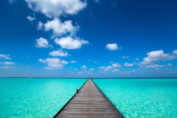 Photo sur Plexiglas Jetée Jetée en bois avec fond bleu mer et ciel
