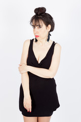 Fototapeta premium Beautiful woman doing different expressions in different sets of clothes: bored