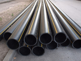 Black PVC pipes on the street