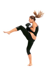 Obraz na płótnie Canvas Young woman boxing
