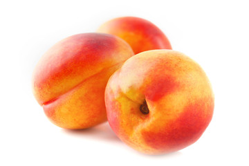 Ripe peach fruit isolated on white