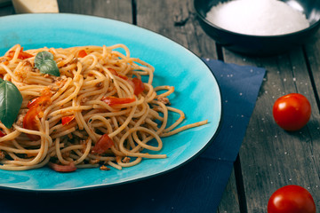 Italian pasta on the wooden table,