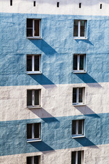 apartment building wall with windows