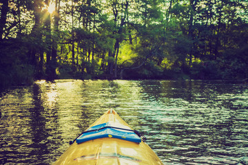 Fototapeta premium Vintage photo of kayaking by Krutynia river in Poland