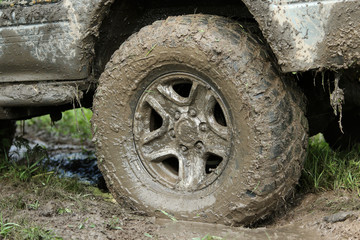 Fototapeta na wymiar Wheel covered with mud