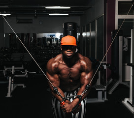Weight training African doing bodybuilding - 89735029