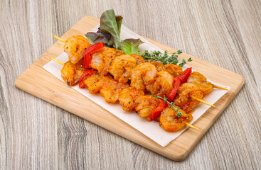 Raw tiger shrimps skewer