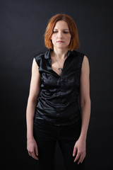 Fototapeta premium Beautiful woman doing different expressions in different sets of clothes: sad