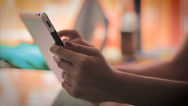 Woman hand using tablet