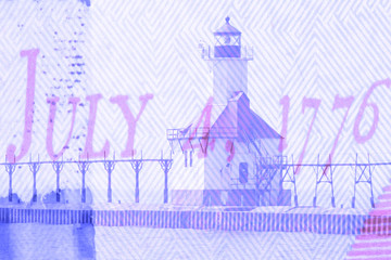 Double exposure St. Joseph north pier lighthouse along shoreline of Lake Michigan with hundred dollar bill background 