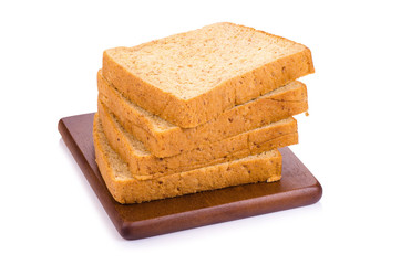 Slice of a whole wheat bread isolated on a white background