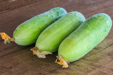 Fresh Cucumbers on the Wooden Table.