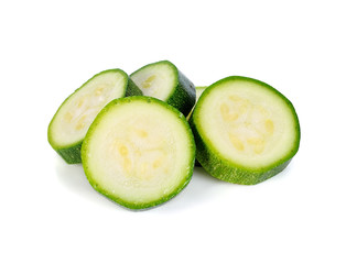 fresh zucchini slices on white background