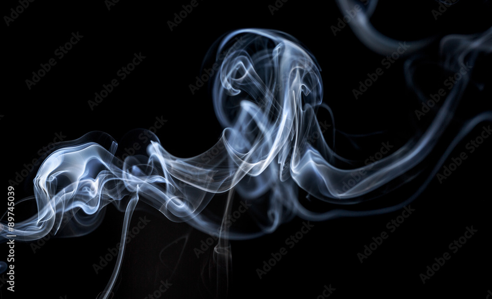 Wall mural abstract smoke on a black background.